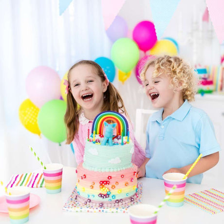 kids fun birthday party with cake and balloons