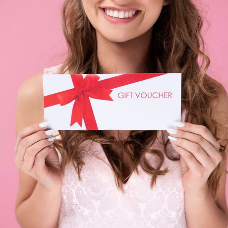 woman holding a gift voucher