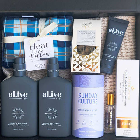 gift hamper with candle, difusser, lotions and sweet treats