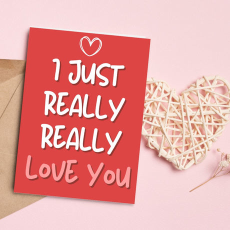 I just really really love you greeting card with hearts in background