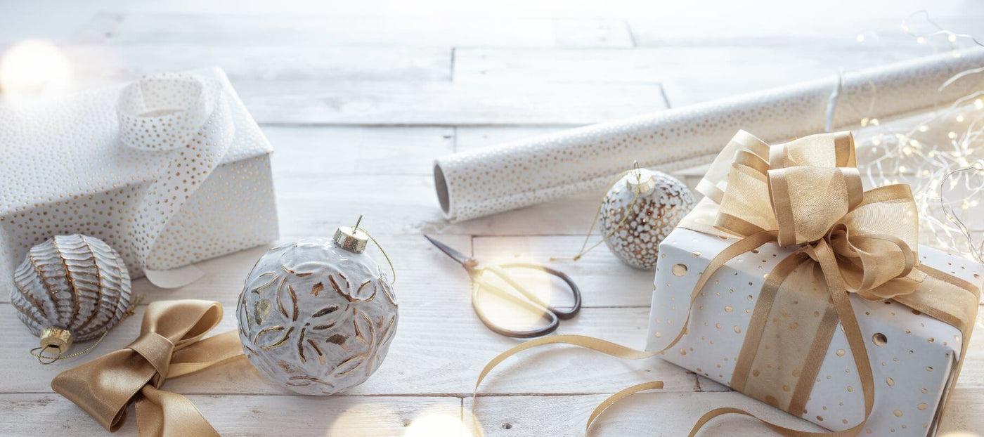 Corporate Giftwrap paper and wrapped gift with decorations