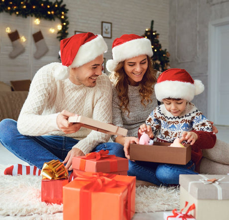 family opening Christmas gifts