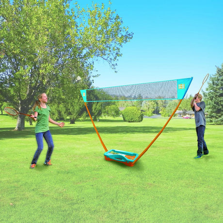 kids playing outside with giant outdoor badminton set