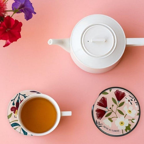 birds eye view of tea cup and coasters