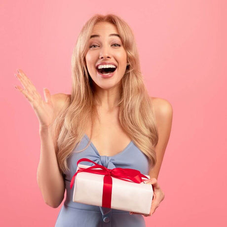 Happy woman with gift