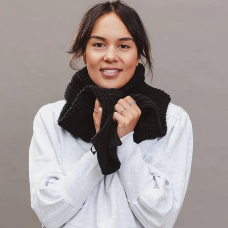 Woman with black designer scarf