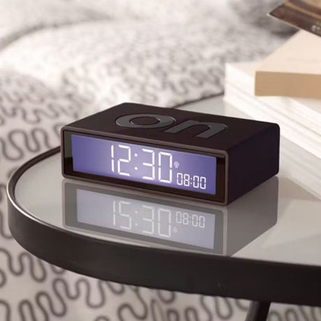 lexon alarm clock on side table