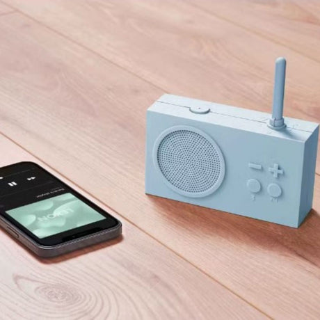light blue radio next to phone 
