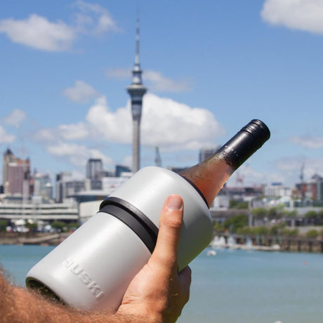 Huski Wine Cooler with Wine bottle and Sky Tower in background