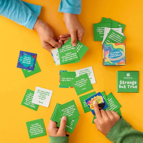 Kids playing trivia on yellow background