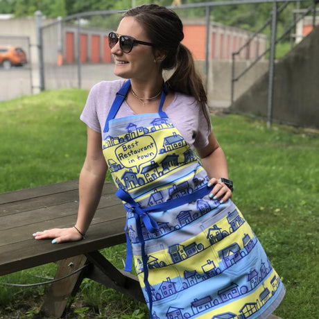 Lady in park with wearing a Best restaurant in town Apron 