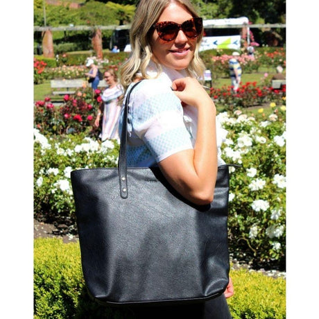 lady with Moana Road Handbag and sunglasses