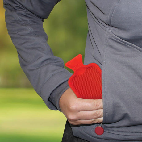 person holding pocket hotty gadget