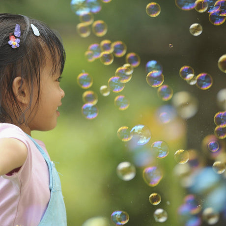 girl with lots of bubbles