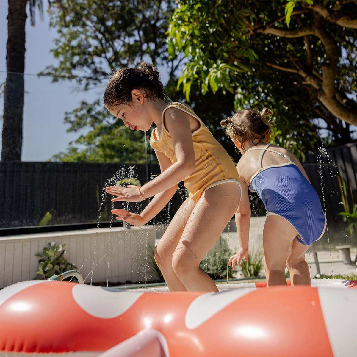 SunnyLife_Kids_Sprinkler_Mat_Poppy_the_Peach_Multi__1_.jpg