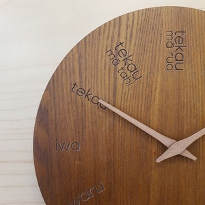 Te reo maori wooden clock from funky gifts nz dark wood
